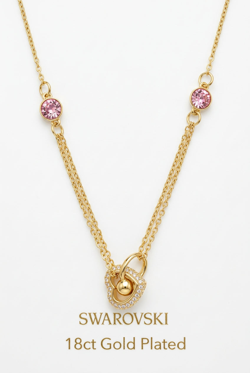 Interlocking heart necklace with pink stones Goldplated