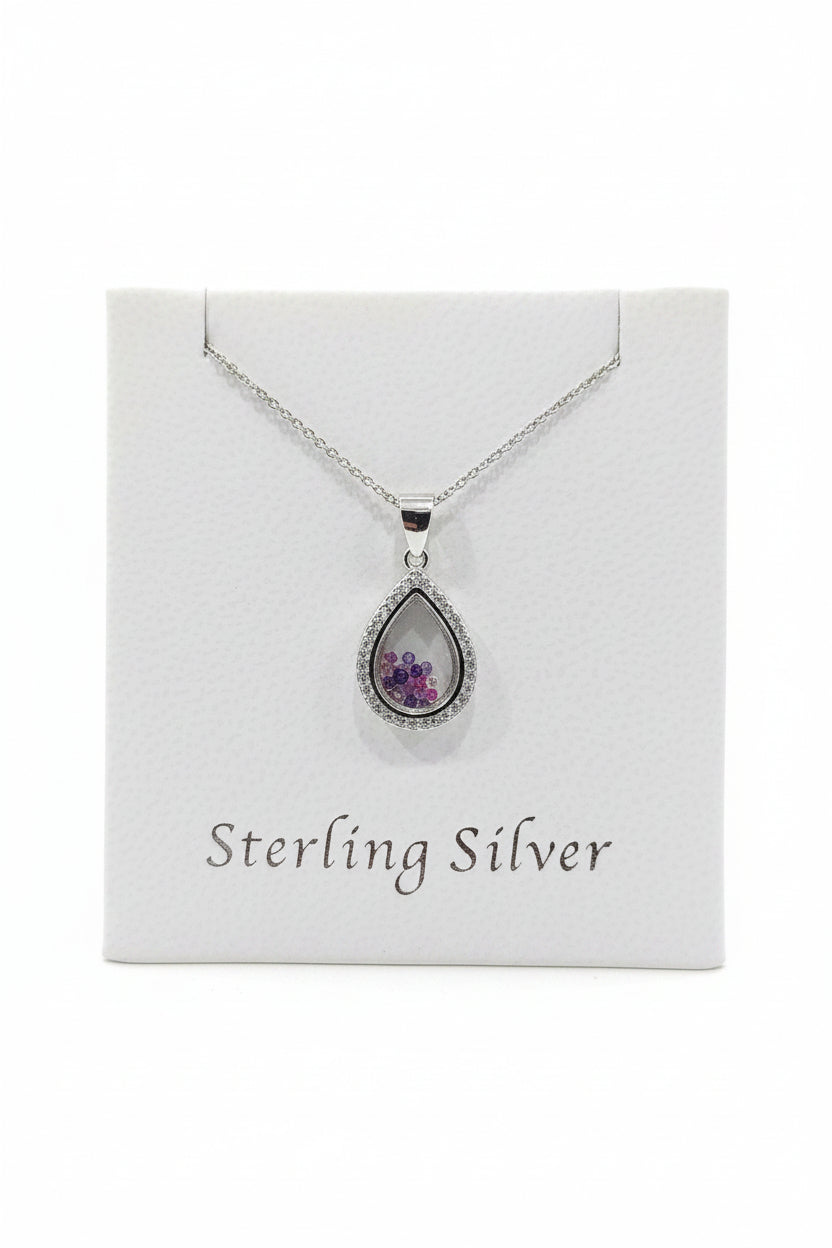 Sterling silver ovel pendant with floating stones