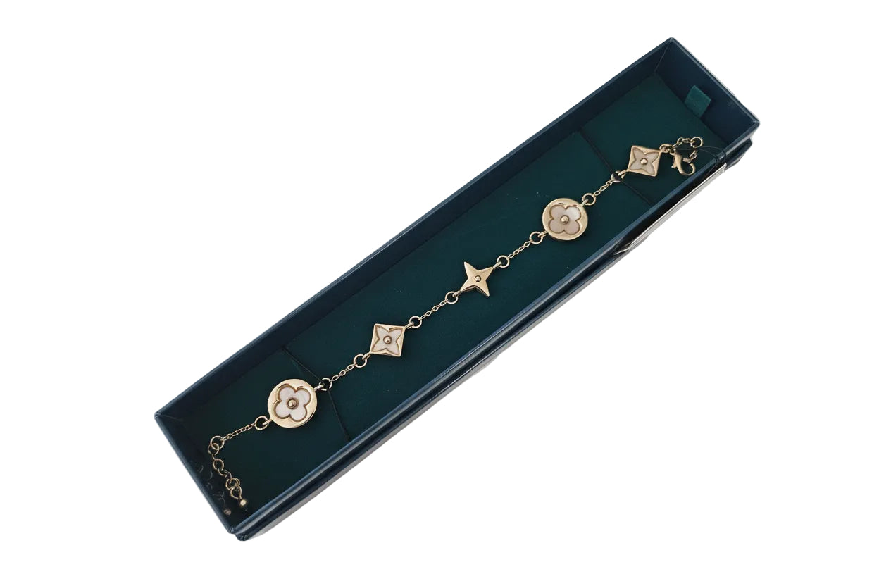 Gold Bracelet with Clover & Flower Detail