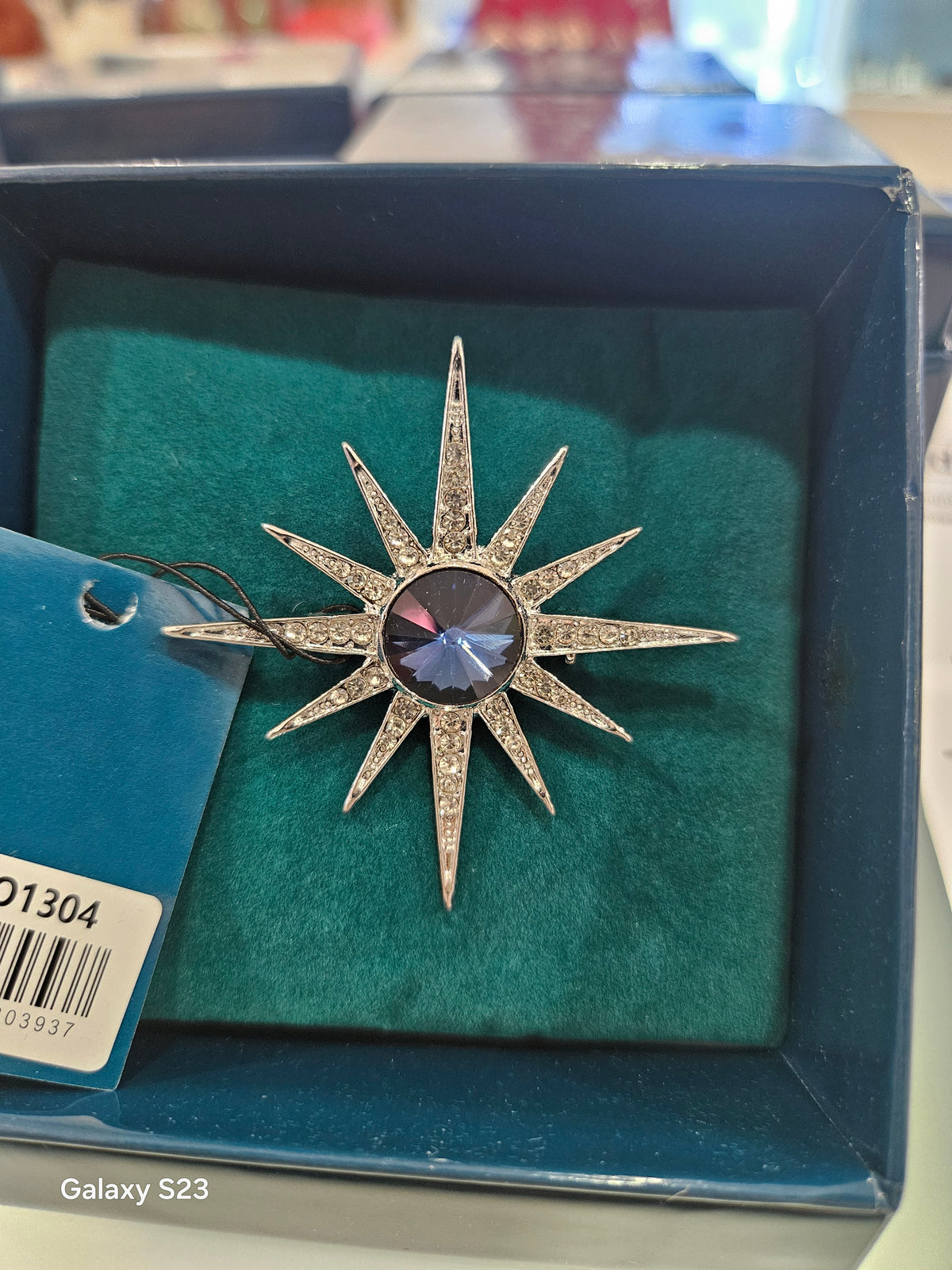 Stardust Silverplated brooch with blue stone