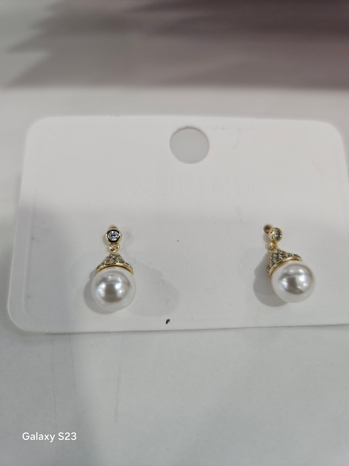 Small drop pearl earrings