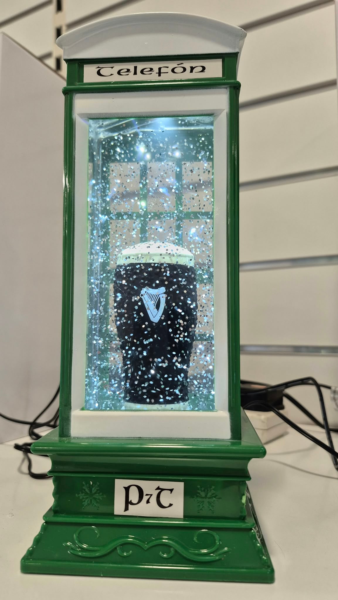 Green Telephone Box with Pint Guinness