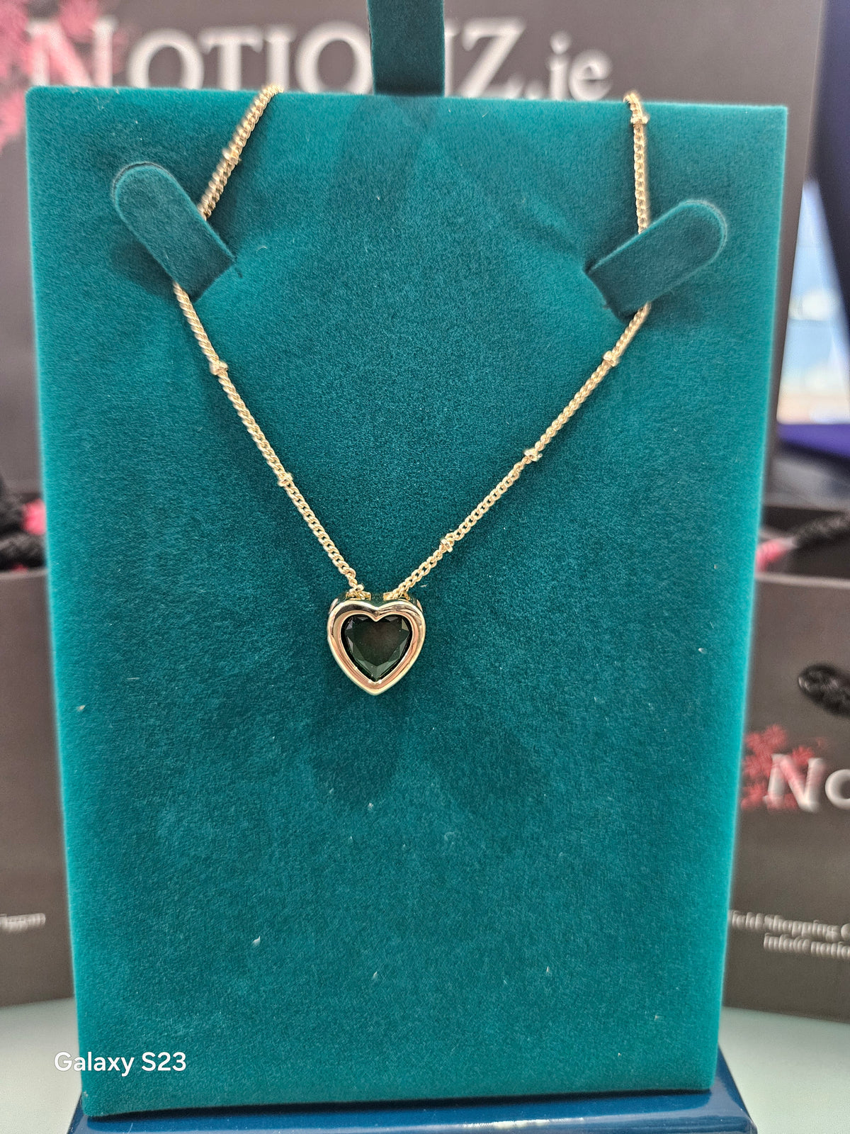 Goldplated heart necklace with green stone