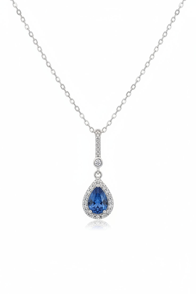 Silver pendant with blue & clear stones