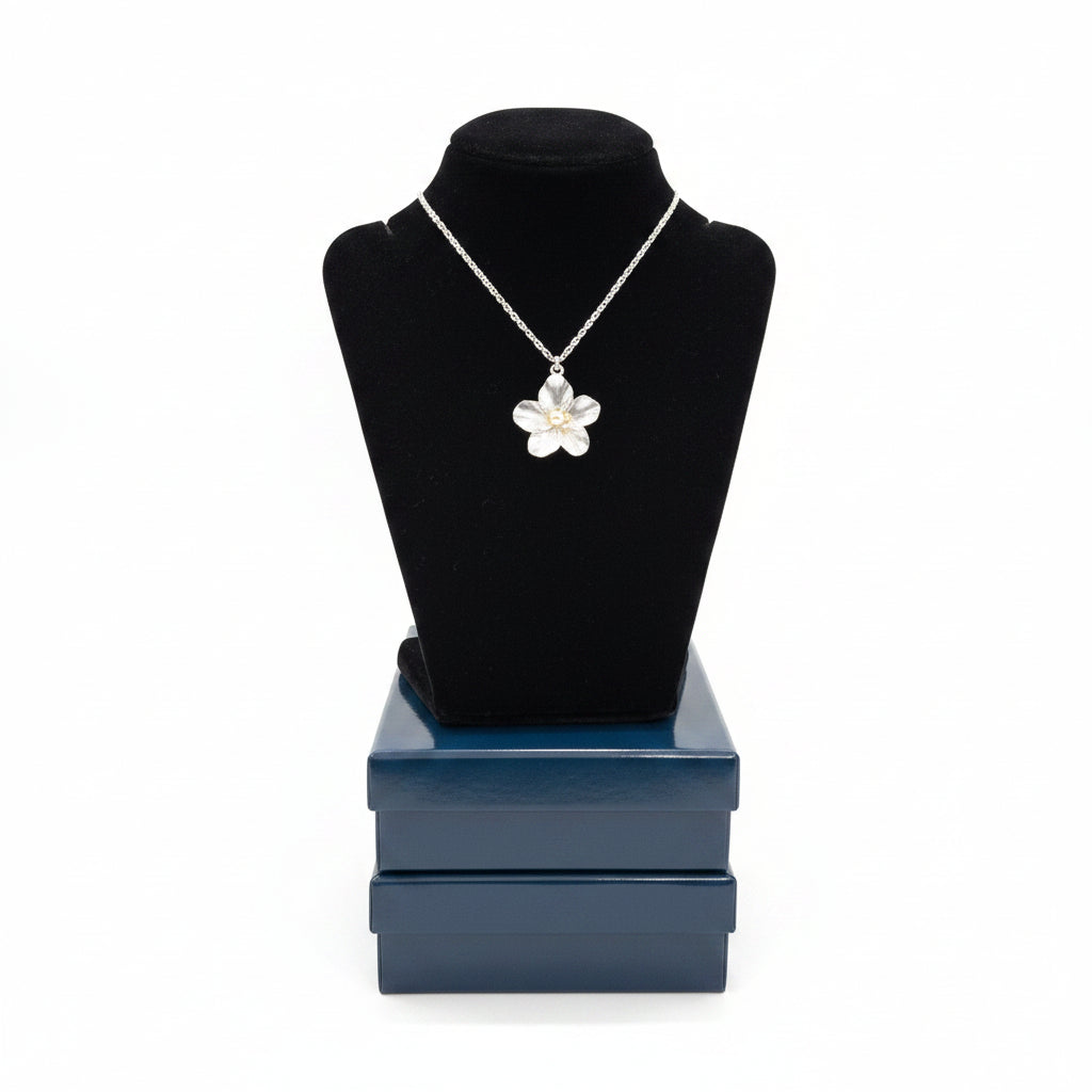 Silver flower pendant