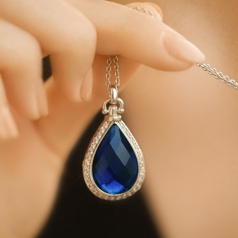 Newbridge Locket with Sapphire Blue Stone