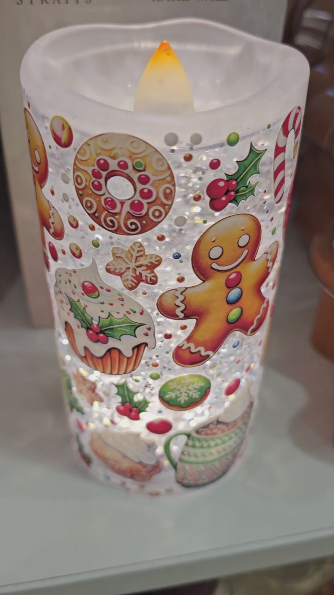 Load video: Led gingerbread  candle water spinner