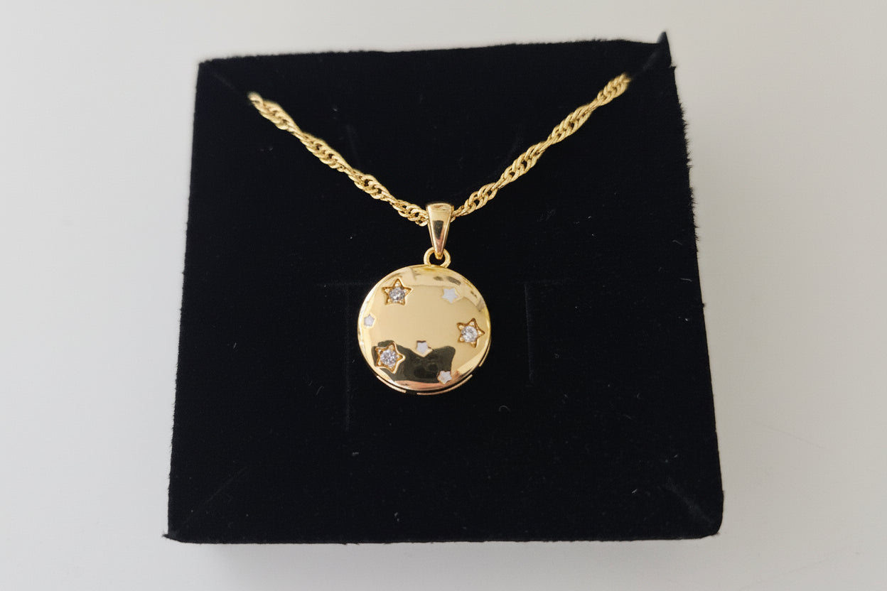 Gold Disc Necklace with Star Cut Out