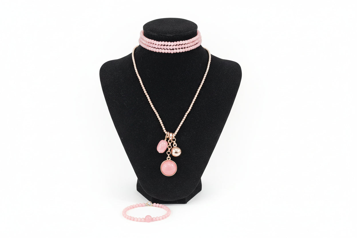 Long gold plated  necklace with salmon  coloured  stones