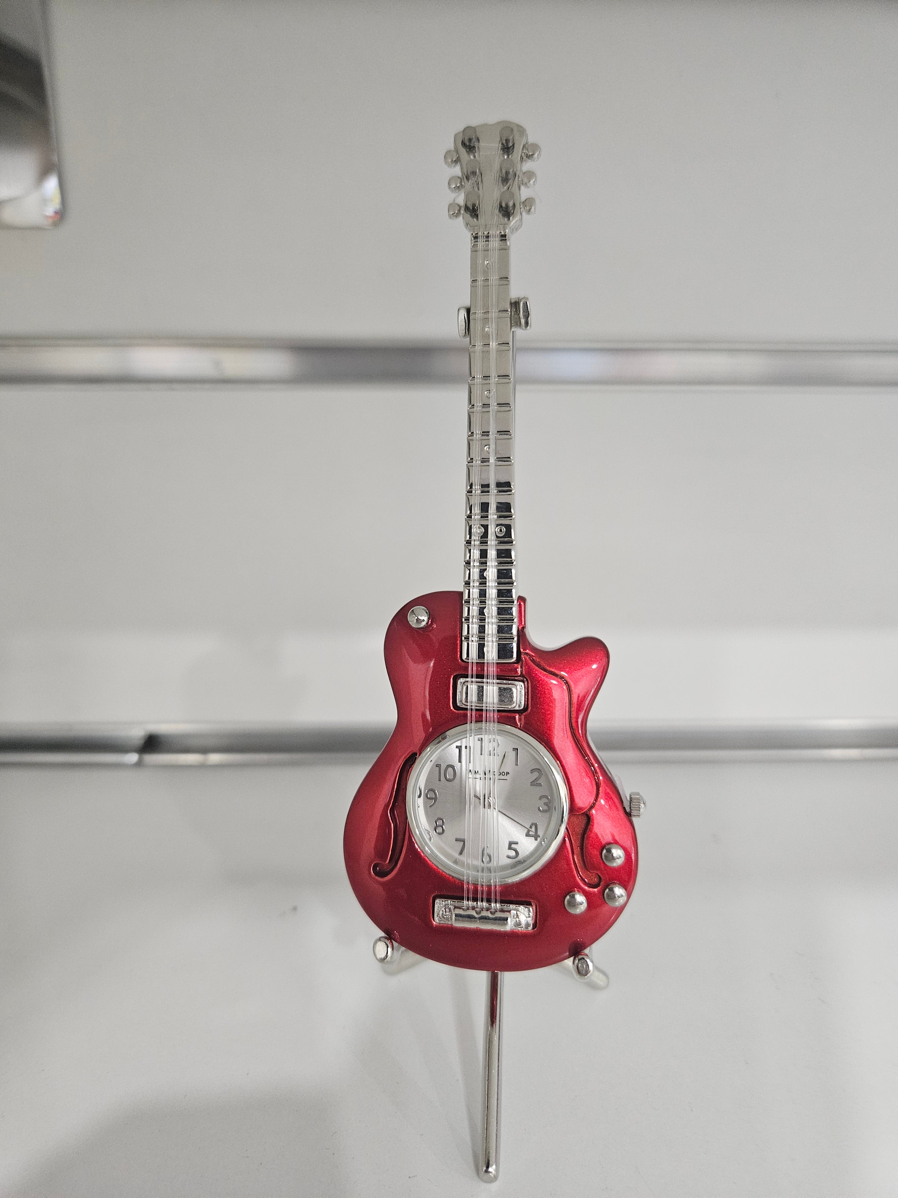 Red miniature  guitar clock