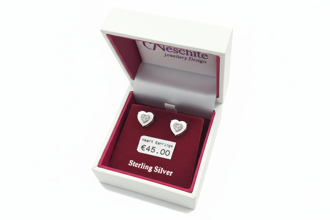 Silver heart mother  of pearl with clear stone