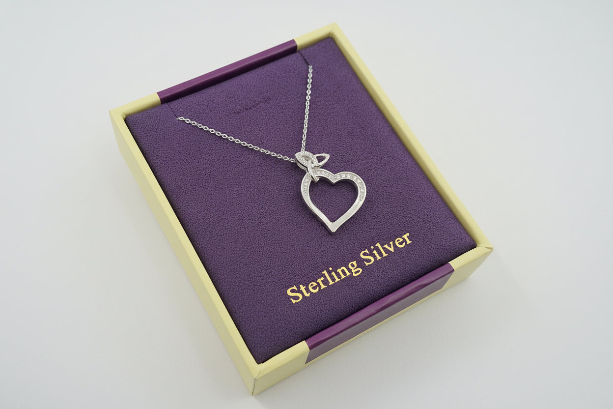 Trinity knot silver heart