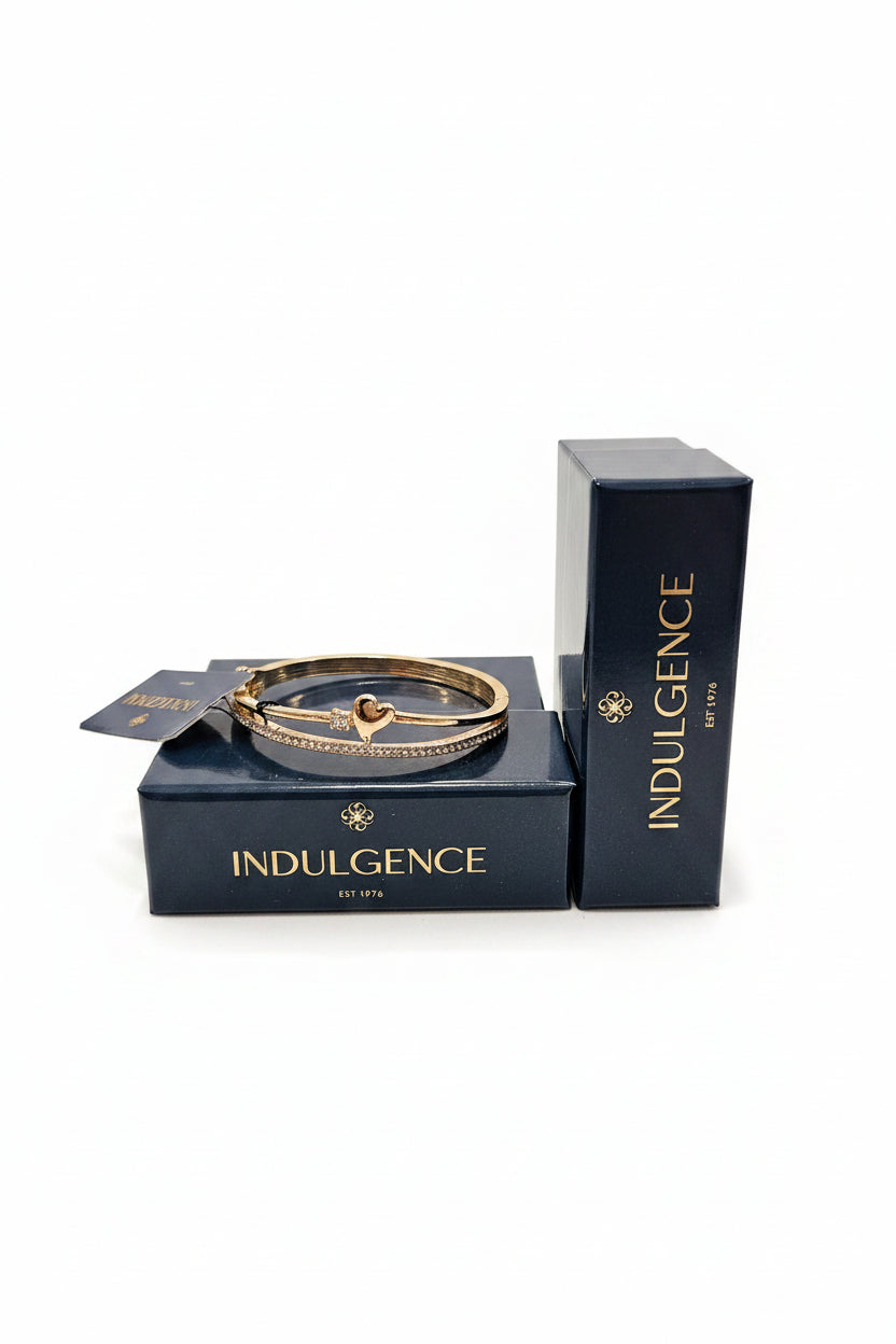 Gold heart bangle with clear stones