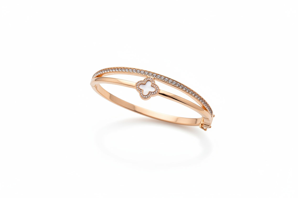 Gold Bracelet with Clover Design
