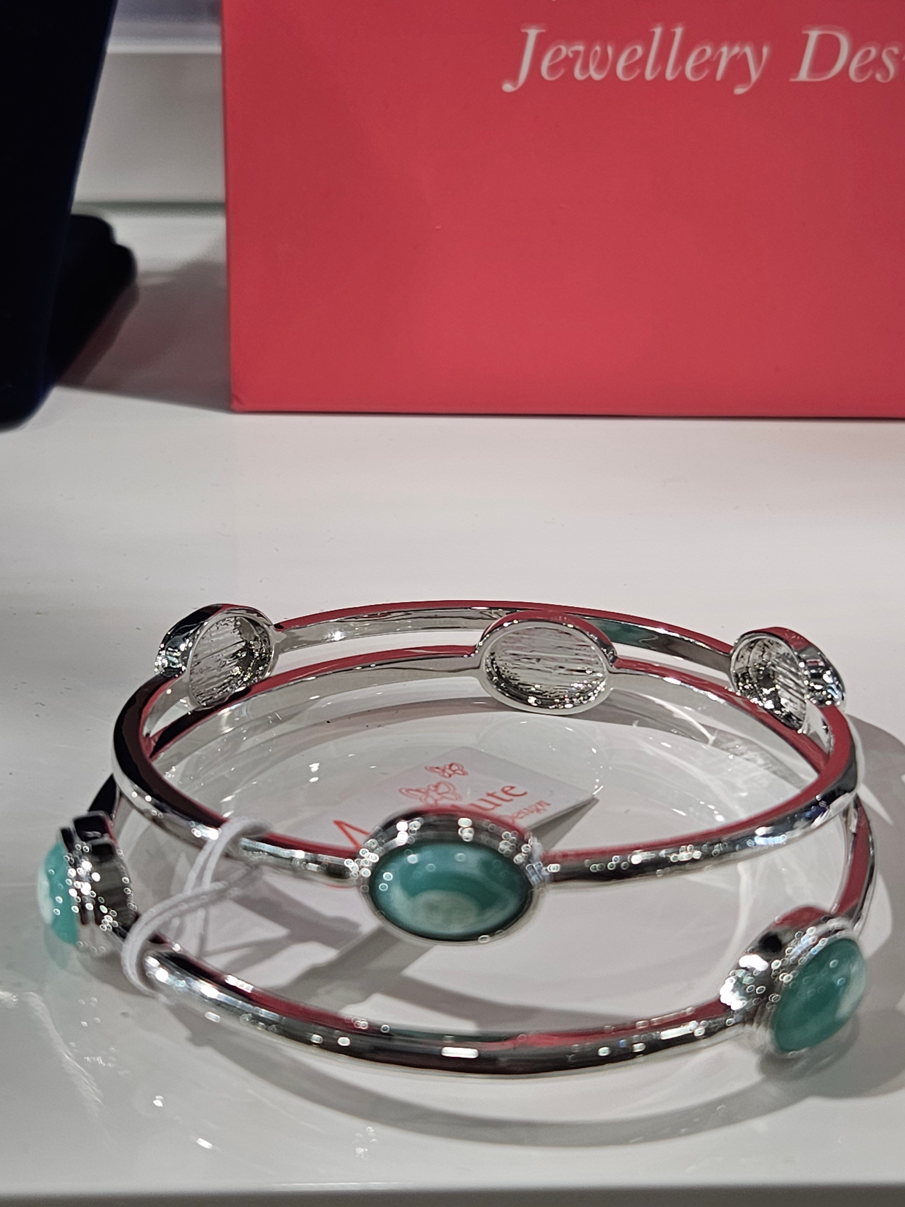 Absolute Silverplated Pair of Bangles with green stone