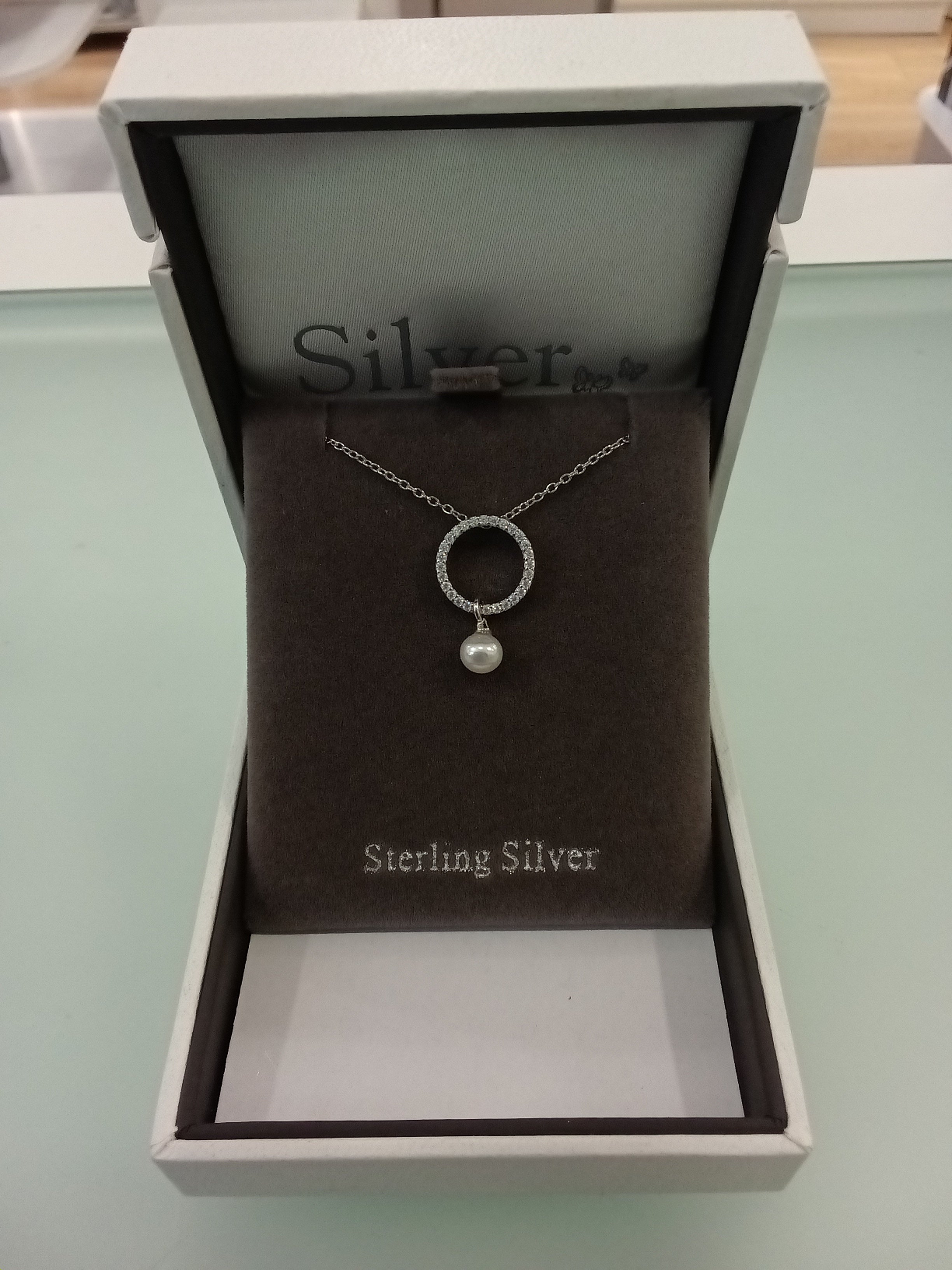 Silver by Absolute Circle with Drop Pear Attment